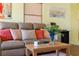 Close up on the living room with a leather sofa and decorative pillows at 538 Southwest N Blvd, St Petersburg, FL 33703