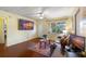 A bright and welcoming living room features hardwood floors and comfortable seating at 538 Southwest N Blvd, St Petersburg, FL 33703