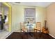 Cozy room with two chairs, a table, a lamp, and a guitar at 538 Southwest N Blvd, St Petersburg, FL 33703