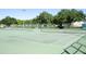 Well-maintained tennis courts in a community setting at 538 Southwest N Blvd, St Petersburg, FL 33703