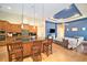 Spacious kitchen with island, stainless steel appliances, and ample cabinetry at 8478 Dunham Station Dr, Tampa, FL 33647