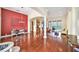Spacious living room with hardwood floors and access to the backyard at 8478 Dunham Station Dr, Tampa, FL 33647