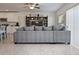 Comfortable living room with sectional sofa and built-in shelving at 12163 Gothic Rd, Spring Hill, FL 34610