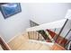 Carpeted staircase with a painted handrail, providing access to the upper levels of the home at 15625 Morning Dr, Lutz, FL 33559