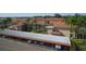 Aerial view of community with building and parking at 19029 Us Highway 19 N # 3-13, Clearwater, FL 33764