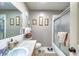 Clean bathroom with tub shower combo and updated vanity at 19029 Us Highway 19 N # 3-13, Clearwater, FL 33764