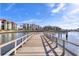 Wooden dock extending over calm water at 19029 Us Highway 19 N # 3-13, Clearwater, FL 33764