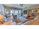 Spacious living room with comfortable sofas and large TV at 19029 Us Highway 19 N # 3-13, Clearwater, FL 33764