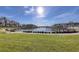 Waterfront view of community with dock and lush landscape at 19029 Us Highway 19 N # 3-13, Clearwater, FL 33764