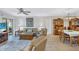 Open living and dining area with water view at 19029 Us Highway 19 N # 9-301, Clearwater, FL 33764