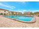 Inviting community pool with surrounding patio at 19029 Us Highway 19 N # 9-301, Clearwater, FL 33764