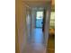Condo entryway with tile flooring and mirrored wall at 2255 Philippine Dr # 35, Clearwater, FL 33763
