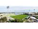 Aerial view of soccer stadium with harbor and city skyline in background at 301 1St S St # 804, St Petersburg, FL 33701