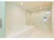 Luxurious bathroom featuring a soaking tub and separate glass enclosed shower at 301 1St S St # 804, St Petersburg, FL 33701