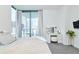 Spacious bedroom with city views and a comfortable bed at 301 1St S St # 804, St Petersburg, FL 33701