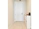 Bright entryway with white door and built-in shoe storage at 301 1St S St # 804, St Petersburg, FL 33701