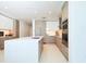 Modern kitchen with light wood cabinets and stainless steel appliances at 301 1St S St # 804, St Petersburg, FL 33701