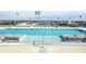 Rooftop pool with lounge chairs and city views at 301 1St S St # 804, St Petersburg, FL 33701