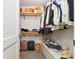 Organized walk-in closet with shelving, storage, and luggage at 301 1St S St # 804, St Petersburg, FL 33701