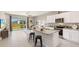 Modern kitchen with granite countertops and stainless steel appliances at 476 Mangrove Shade Cir, Apollo Beach, FL 33572
