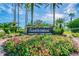 Saddlebrook community sign surrounded by colorful flower beds at 5474 Kemkerry Rd, Wesley Chapel, FL 33543
