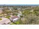 An aerial view of a house nestled in a tree-lined neighborhood at 5529 11Th N Ave, St Petersburg, FL 33710