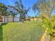 Spacious backyard with two sheds and a well-manicured lawn at 5529 11Th N Ave, St Petersburg, FL 33710