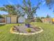 Backyard with shed and circular garden at 5529 11Th N Ave, St Petersburg, FL 33710