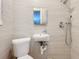 Updated bathroom with shower, toilet and sink at 5529 11Th N Ave, St Petersburg, FL 33710