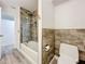 Bathroom with tub, shower, and updated fixtures at 5529 11Th N Ave, St Petersburg, FL 33710