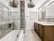 Updated bathroom with double vanity, walk-in shower, and modern finishes at 5529 11Th N Ave, St Petersburg, FL 33710