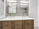 Double vanity bathroom with modern lighting and storage at 5529 11Th N Ave, St Petersburg, FL 33710