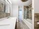 Double vanity bathroom with modern lighting and storage at 5529 11Th N Ave, St Petersburg, FL 33710