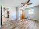Spacious bedroom with wood-look floors and built-in closet at 5529 11Th N Ave, St Petersburg, FL 33710
