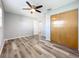 Bedroom with wood-look floors and double door closet at 5529 11Th N Ave, St Petersburg, FL 33710