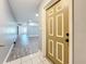 Light and airy entryway with golden door and view of living area at 5529 11Th N Ave, St Petersburg, FL 33710