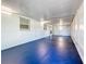 Florida room with blue tile flooring and multiple windows at 5529 11Th N Ave, St Petersburg, FL 33710