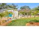 Attractive front yard with mature landscaping at 5529 11Th N Ave, St Petersburg, FL 33710
