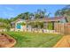 Landscaped front yard with curb appeal at 5529 11Th N Ave, St Petersburg, FL 33710