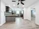Modern kitchen with gray cabinets, granite countertops, and stainless steel appliances at 5529 11Th N Ave, St Petersburg, FL 33710