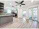 Modern kitchen with gray cabinets and granite countertops at 5529 11Th N Ave, St Petersburg, FL 33710