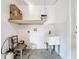 Laundry room with utility sink and built-in shelving at 5529 11Th N Ave, St Petersburg, FL 33710