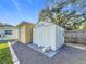 Tan and white sheds offer extra storage space at 5529 11Th N Ave, St Petersburg, FL 33710