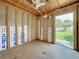Unfinished workshop with window and ceiling fan at 5529 11Th N Ave, St Petersburg, FL 33710
