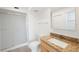 Bathroom with granite countertop and walk-in shower at 8701 Blind Pass Rd # 306B, St Pete Beach, FL 33706