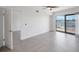 Bright bedroom with access to another room and tile floors at 8701 Blind Pass Rd # 306B, St Pete Beach, FL 33706