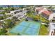 Two well-maintained tennis courts at 8701 Blind Pass Rd # 306B, St Pete Beach, FL 33706