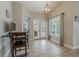Cozy breakfast nook with natural light and views to the outdoors via a large window and glass patio doors at 1000 Chillum Ct, Safety Harbor, FL 34695