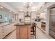 Spacious kitchen with white cabinetry, granite countertops, and stainless steel appliances at 1000 Chillum Ct, Safety Harbor, FL 34695