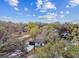 Single story house with a large backyard and surrounding trees at 11650 County Road 579 Hwy, Thonotosassa, FL 33592